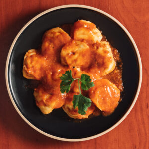 Agnolotis de carne con salsa fileto